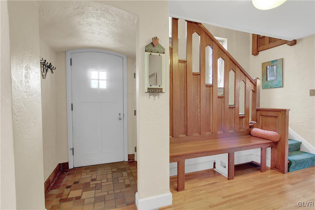 414 South Tulpehocken Road Reading, PA 19601 - Photo 3 of 41 a view of a hallway with wooden floor and furniture