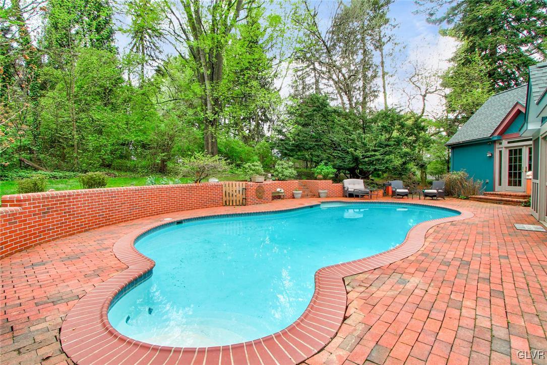 414 South Tulpehocken Road Reading, PA 19601 - Photo 32 of 41 a view of a swimming pool with a sitting space