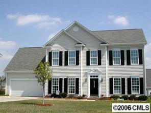627 Eaton Court Fort Mill, SC 29708 - Photo 1 of 8 a front view of a house with a garden