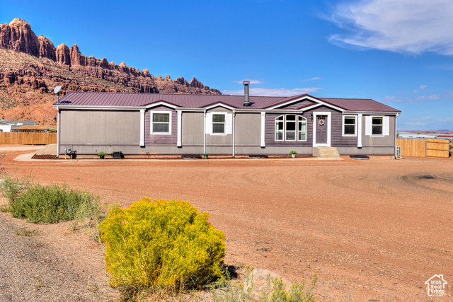 33 Merriam Court Moab, UT 84532 - Photo 54 of 56 View of house with Moab Rim