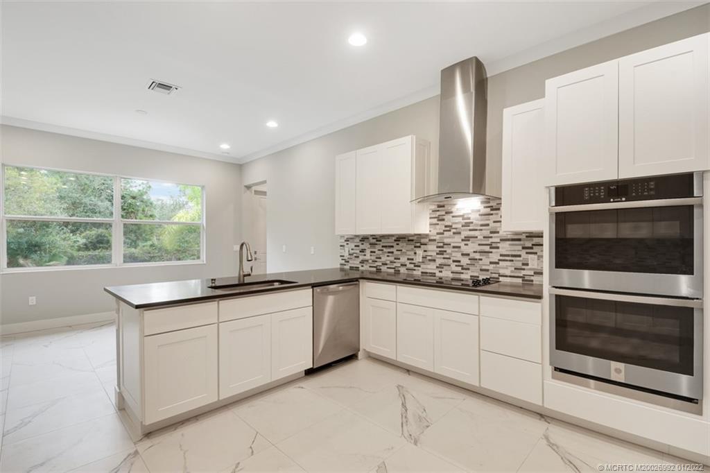 2161 Southwest Oasis Terrace Stuart, FL 34997 - Photo 32 of 72 Kitchen