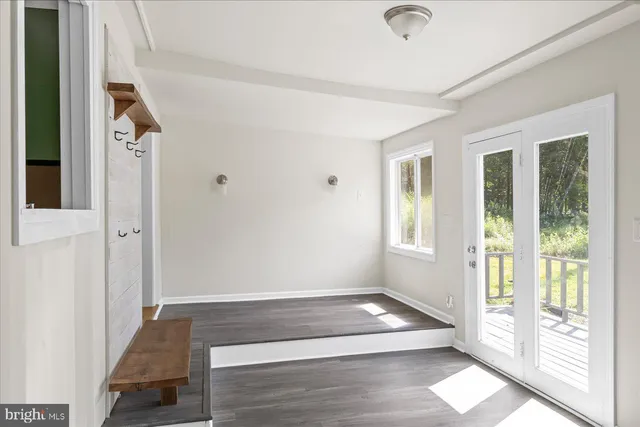 a view of entryway with wooden floor