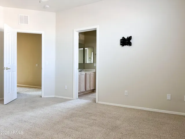 an empty room with a door