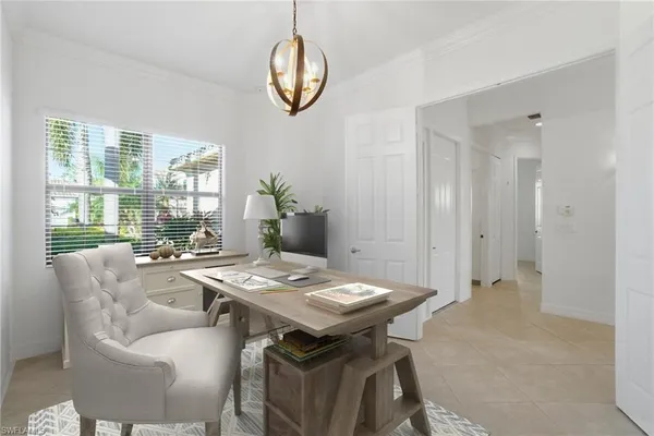 a view of a dining room with furniture window and outside view