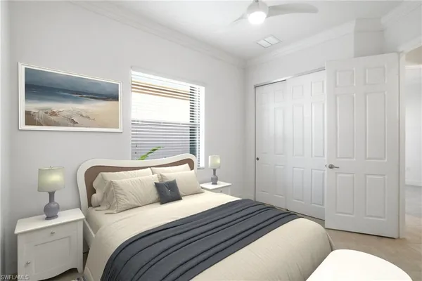 a bedroom with bed and window