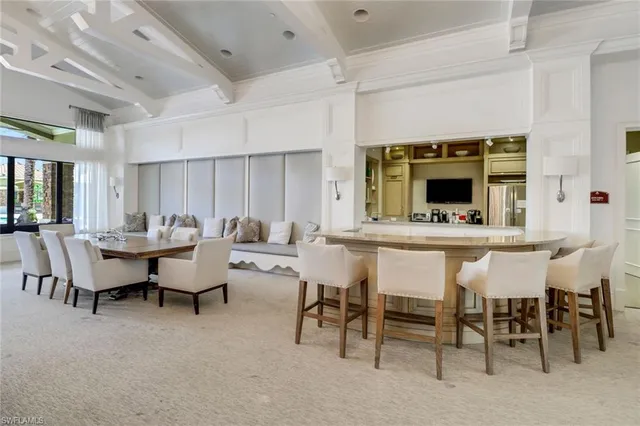 a view of a livingroom with furniture and a chandelier