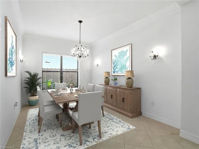 a view of a dining room with furniture and window