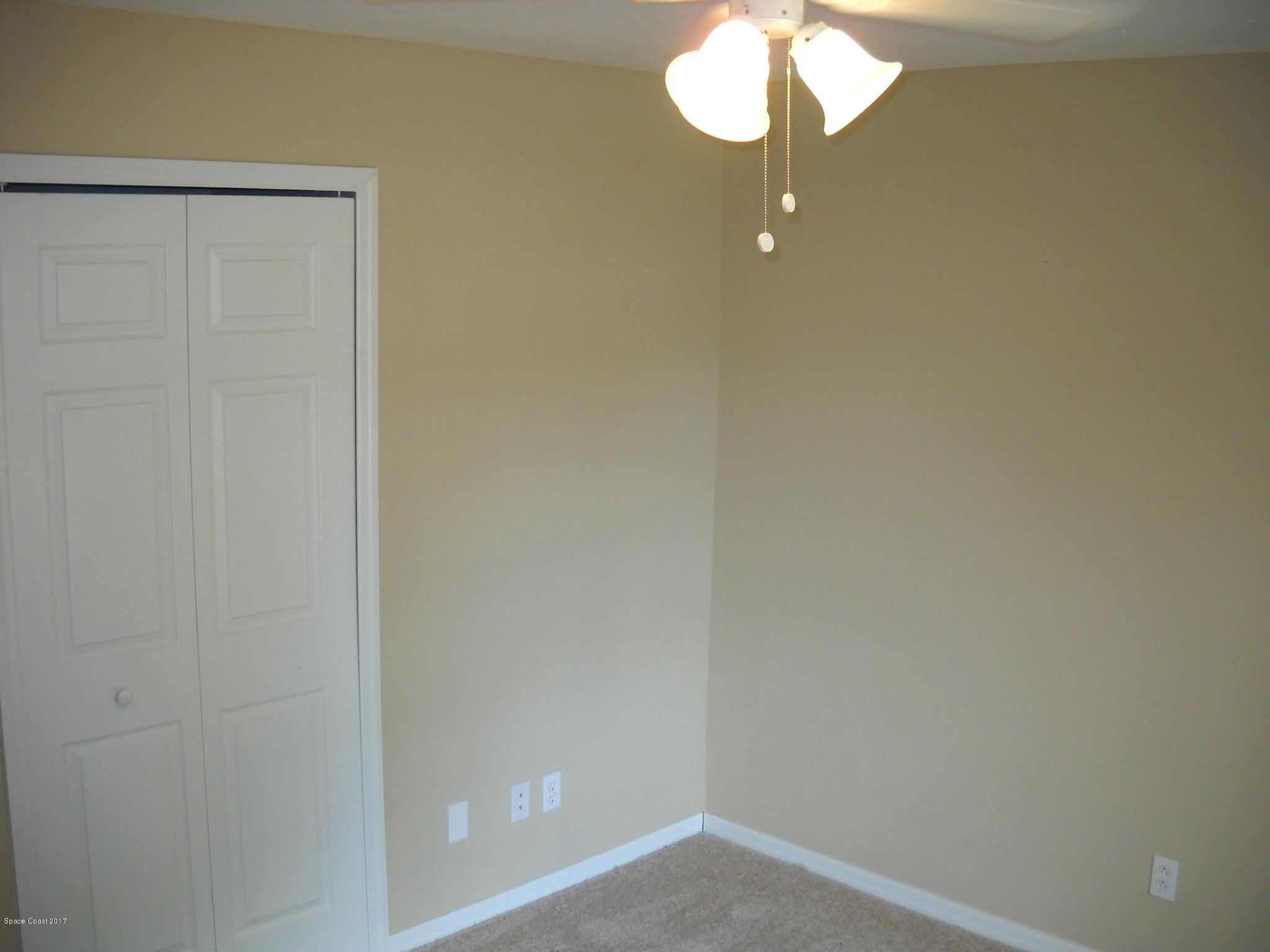 5660 Holden Road Cocoa, FL 32927 - Photo 15 of 21 3rd bedroom closet view