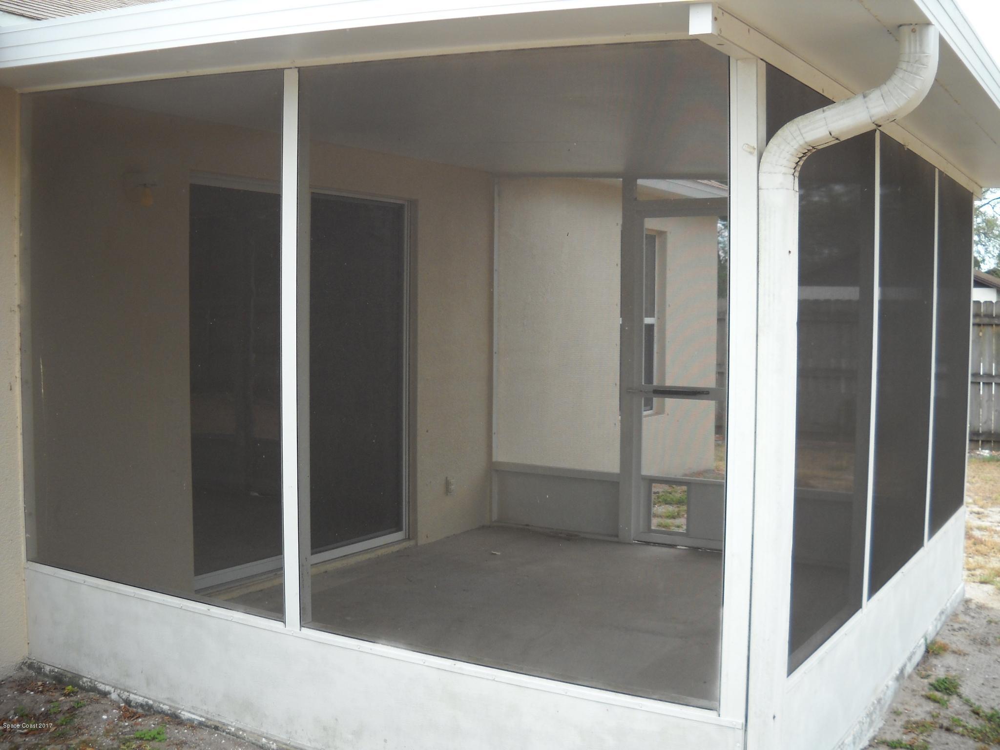 5660 Holden Road Cocoa, FL 32927 - Photo 17 of 21 Screened porch view