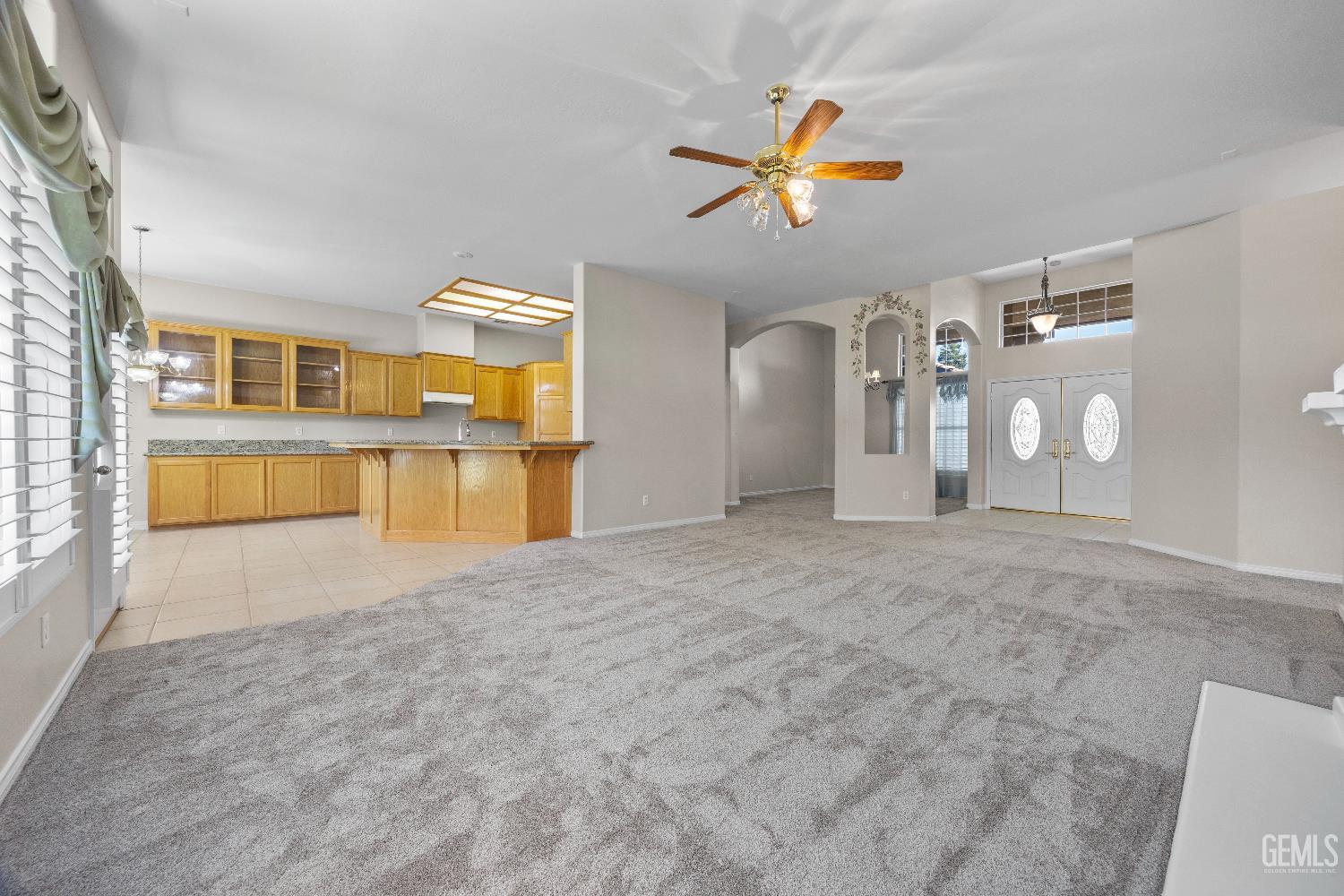 Undisclosed Address Bakersfield, CA 93312 - Photo 17 of 45 a view of a kitchen with a sink and cabinets