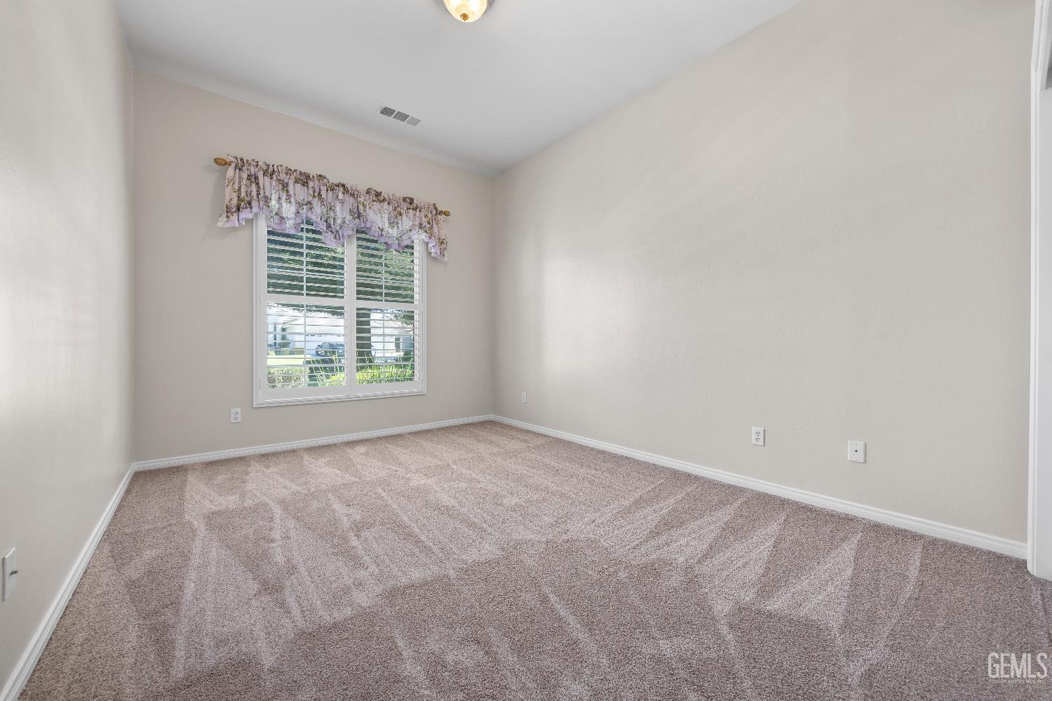 Undisclosed Address Bakersfield, CA 93312 - Photo 35 of 45 an empty room with a window