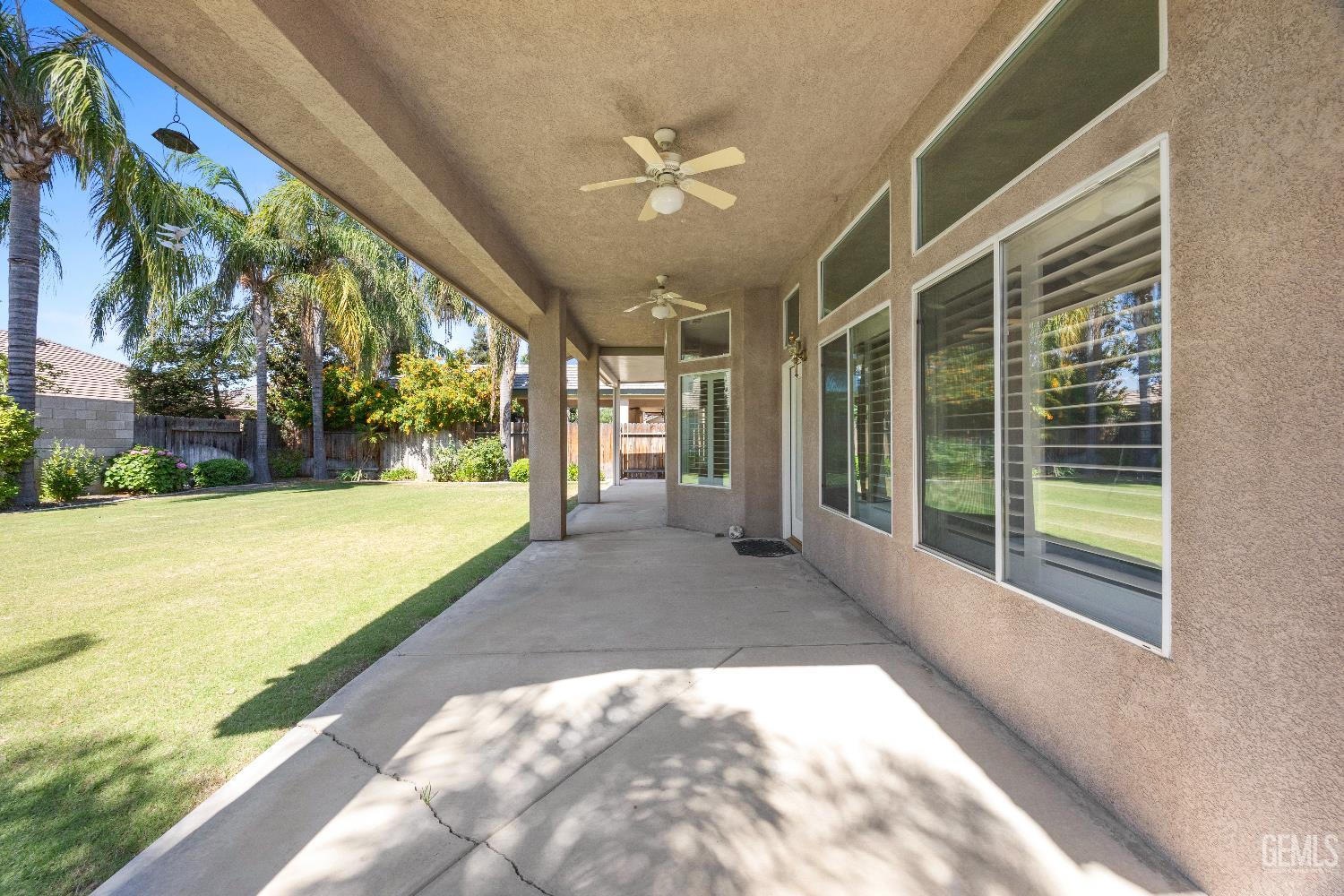 Undisclosed Address Bakersfield, CA 93312 - Photo 38 of 45 a view of a building with a swimming pool