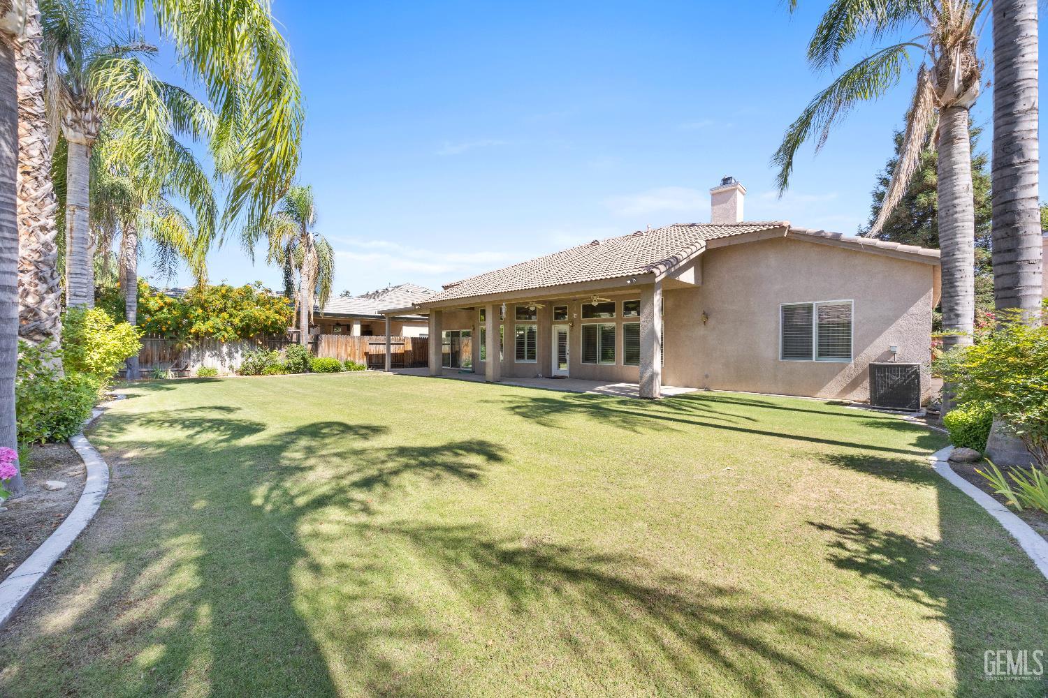 Undisclosed Address Bakersfield, CA 93312 - Photo 40 of 45 a view of a house with a swimming pool