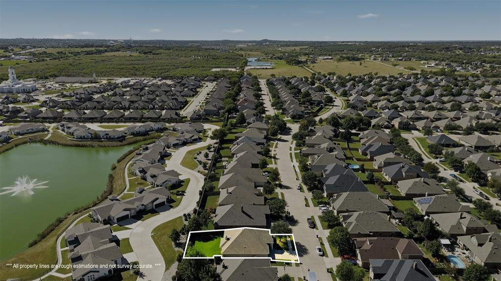 1663 Potomac Drive Burleson, TX 76028 - Photo 23 of 25 an aerial view of a city with ocean view