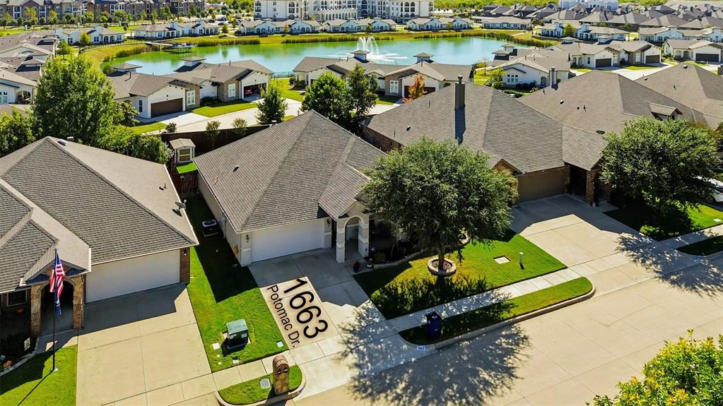 1663 Potomac Drive Burleson, TX 76028 - Photo 24 of 25 an aerial view of a house with a swimming pool yard and outdoor seating