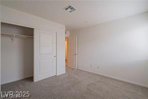 12347 Indigo Montage Road, Unit 3 Las Vegas, NV 89183 - Photo 12 of 23 A well-proportioned bedroom offers ample space, clean carpeting, and practical closet storage.
