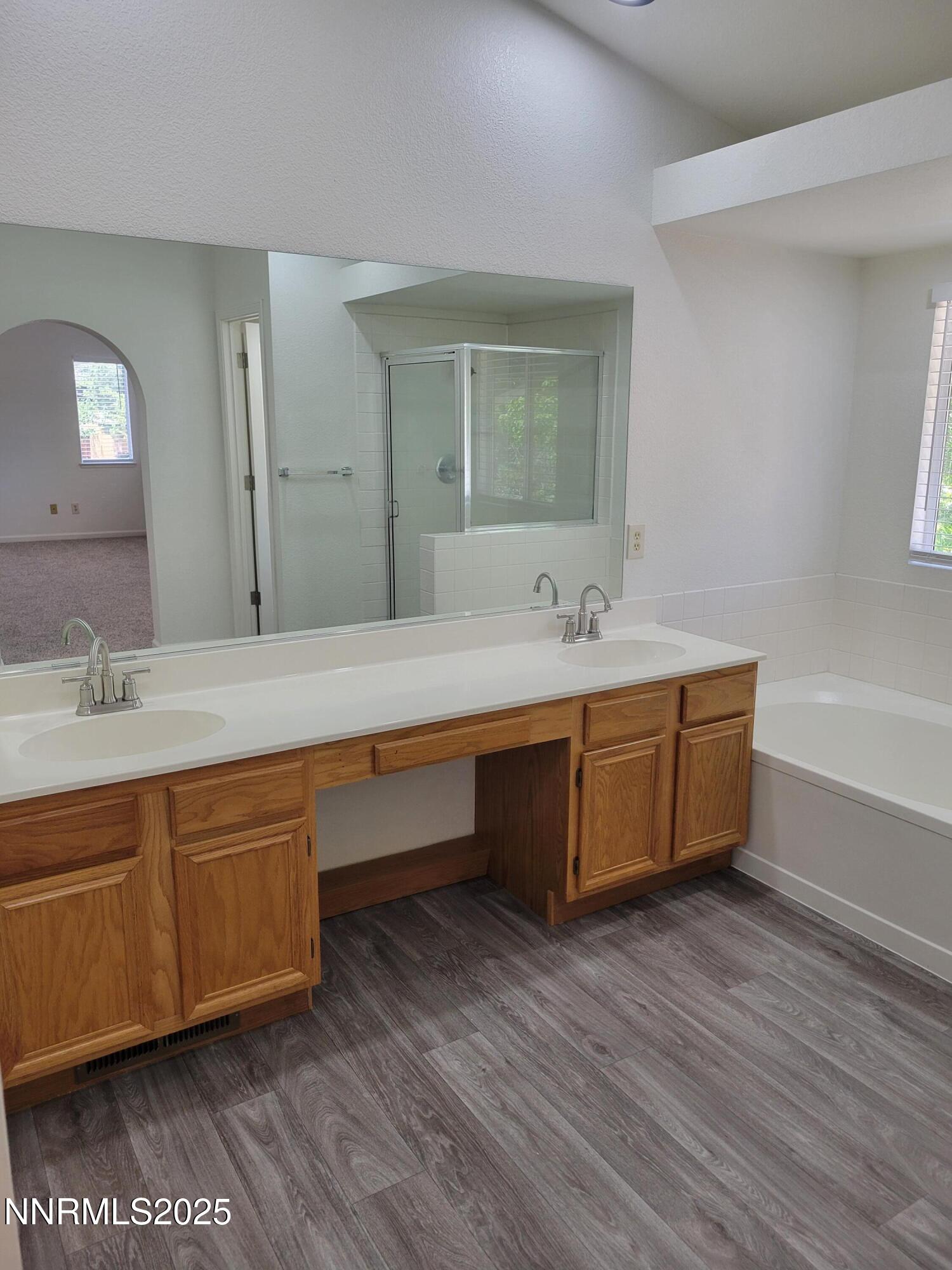 2967 Aspendale Drive Reno, NV 89503 - Photo 17 of 20 a bathroom with a double vanity sink and a mirror