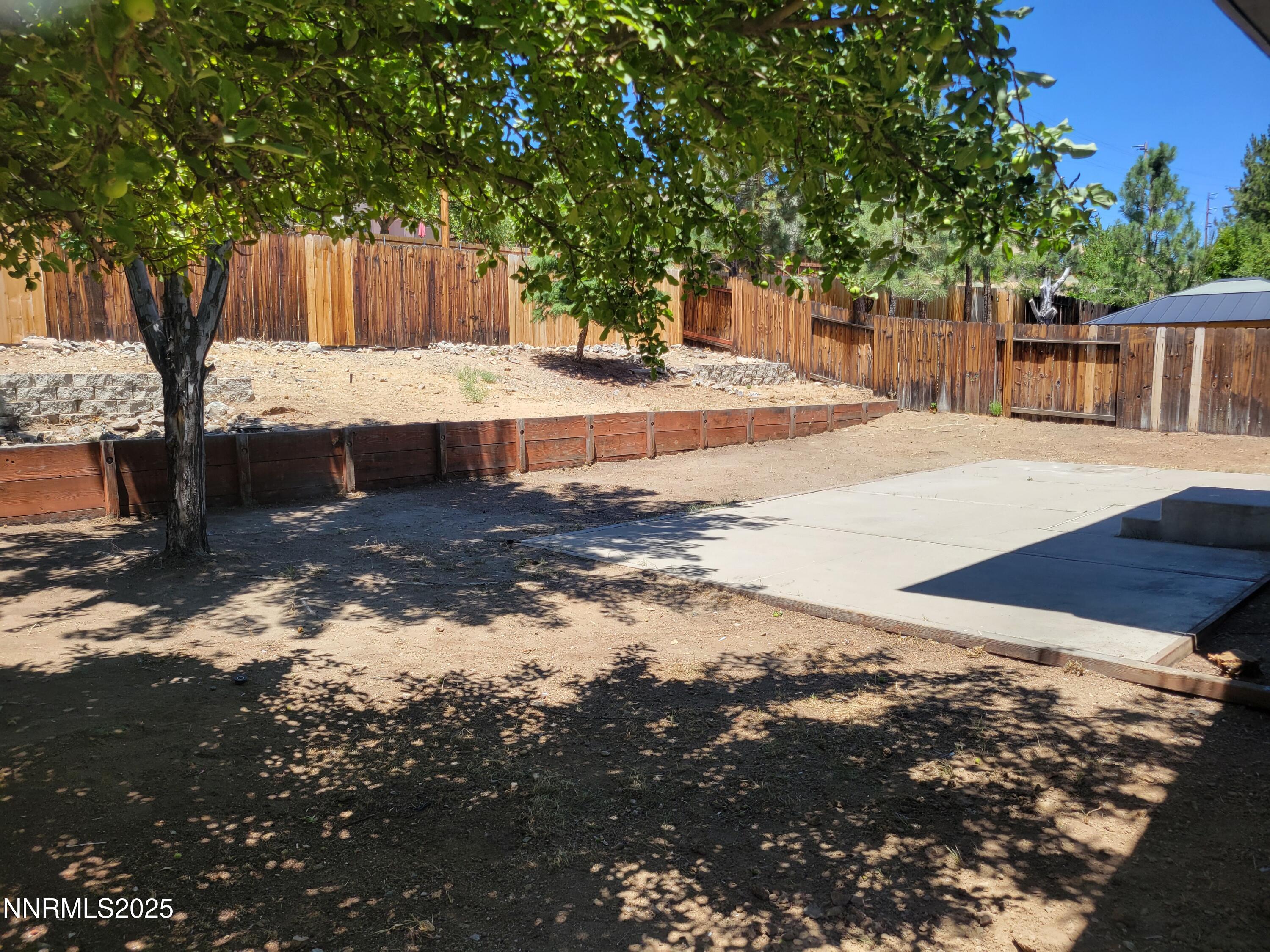 2967 Aspendale Drive Reno, NV 89503 - Photo 20 of 20 a view of a yard with large trees