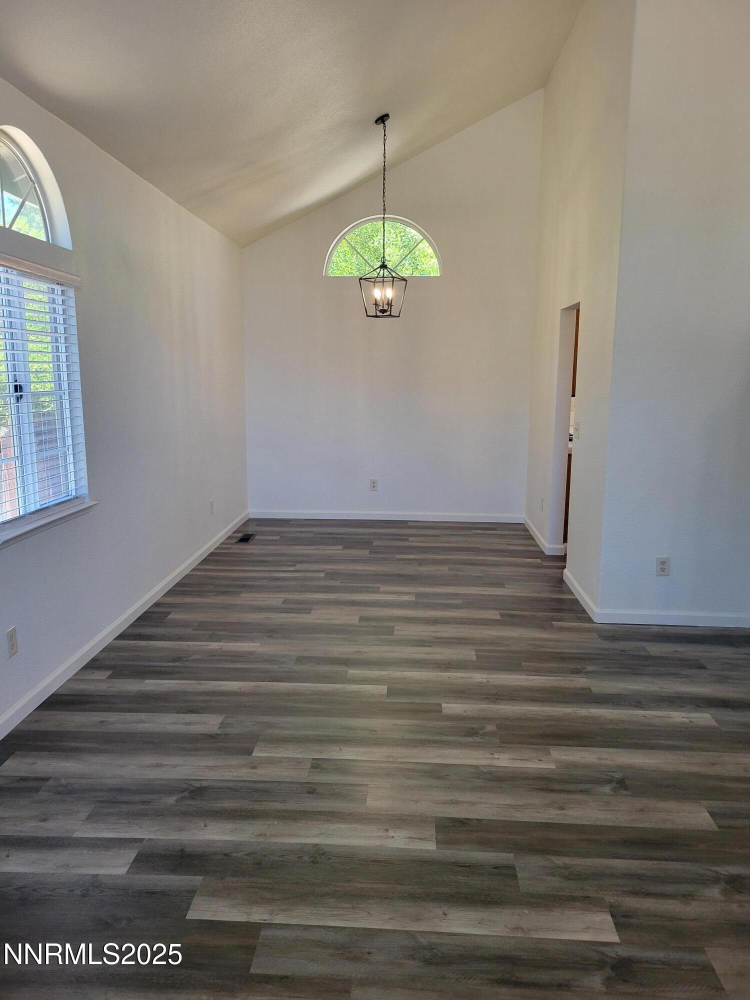 2967 Aspendale Drive Reno, NV 89503 - Photo 3 of 20 a view of a room with wooden floor and window