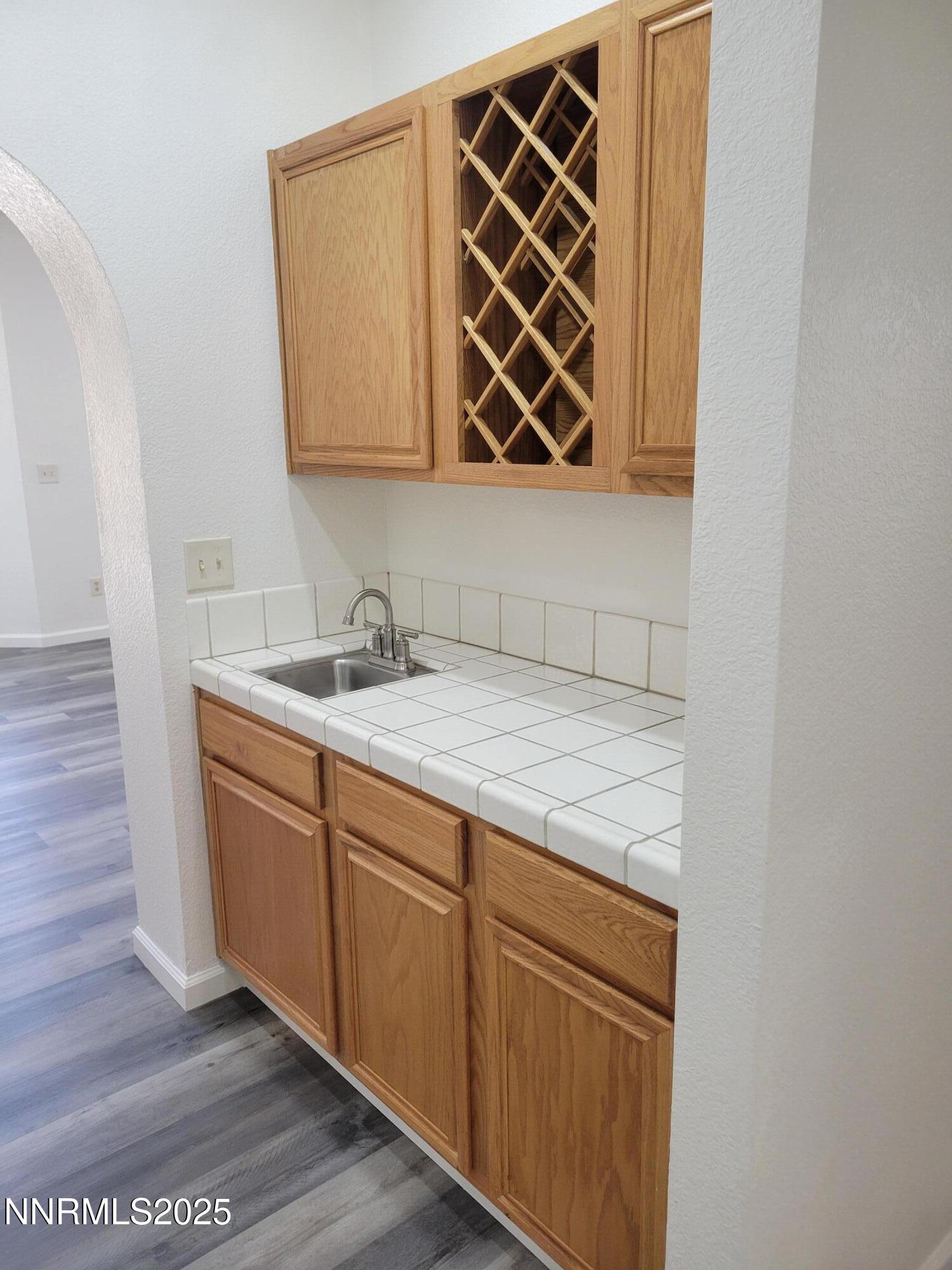 2967 Aspendale Drive Reno, NV 89503 - Photo 6 of 20 a bathroom with a sink and a mirror