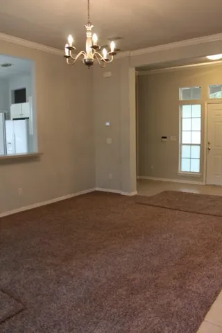 a kitchen with a sink stove and refrigerator