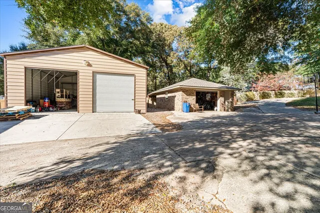a view of a swimming pool with a yard