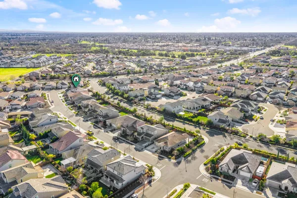 an aerial view of residential building with parking space