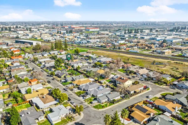 an aerial view of a city with lots of residential buildings