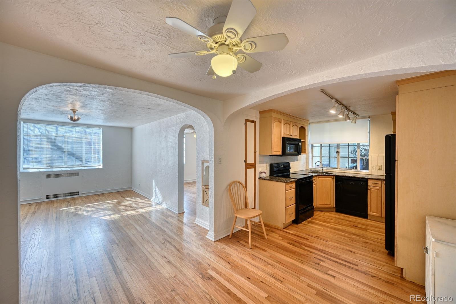 485 South Logan Street, Unit 16 Denver, CO 80209 - Photo 2 of 14 a view of a kitchen with a sink and cabinet