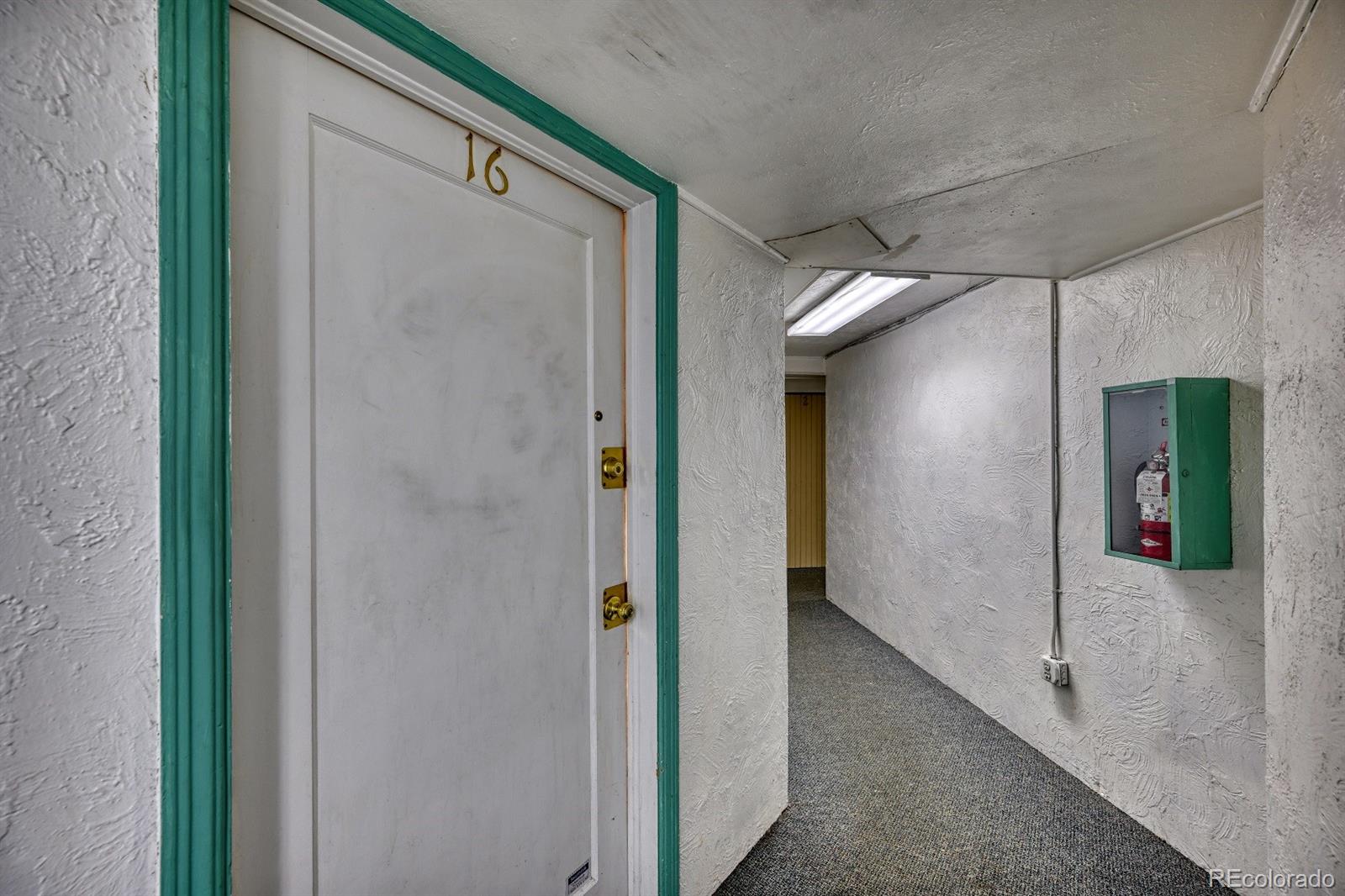485 South Logan Street, Unit 16 Denver, CO 80209 - Photo 6 of 14 a view of a hallway