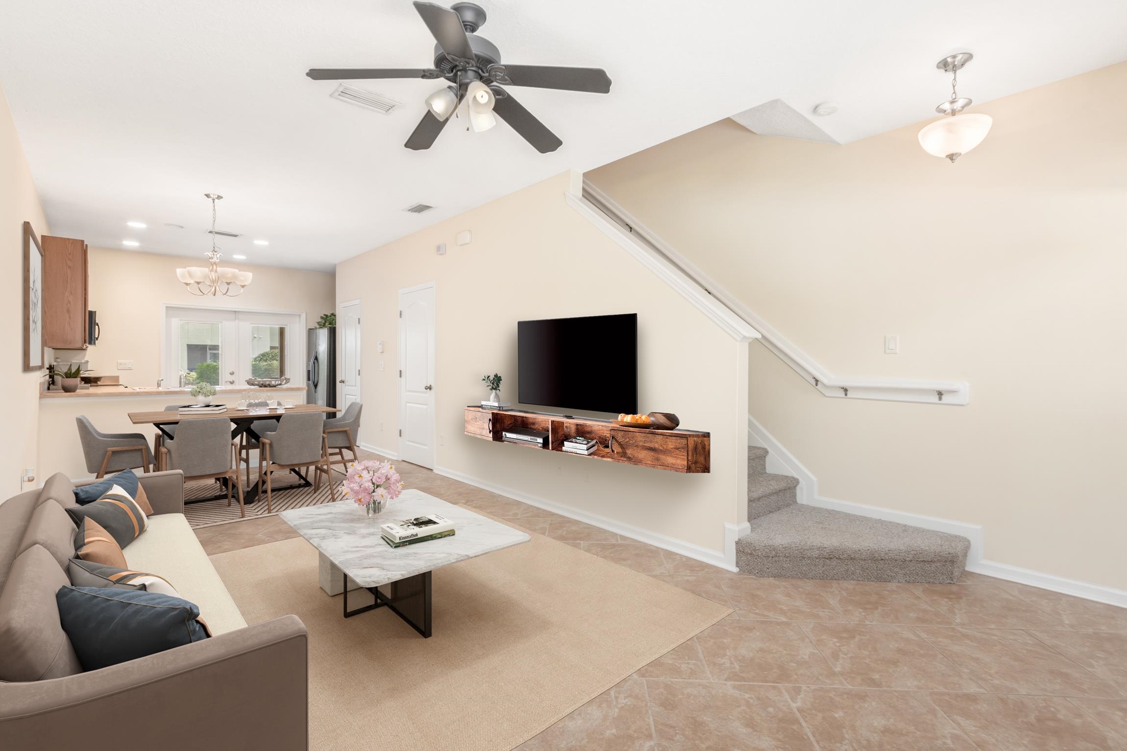 616 Drake Bay Terrace St. Augustine, FL 32084 - Photo 7 of 39 a living room with furniture and a flat screen tv