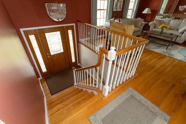 a view of stairs with wooden floor