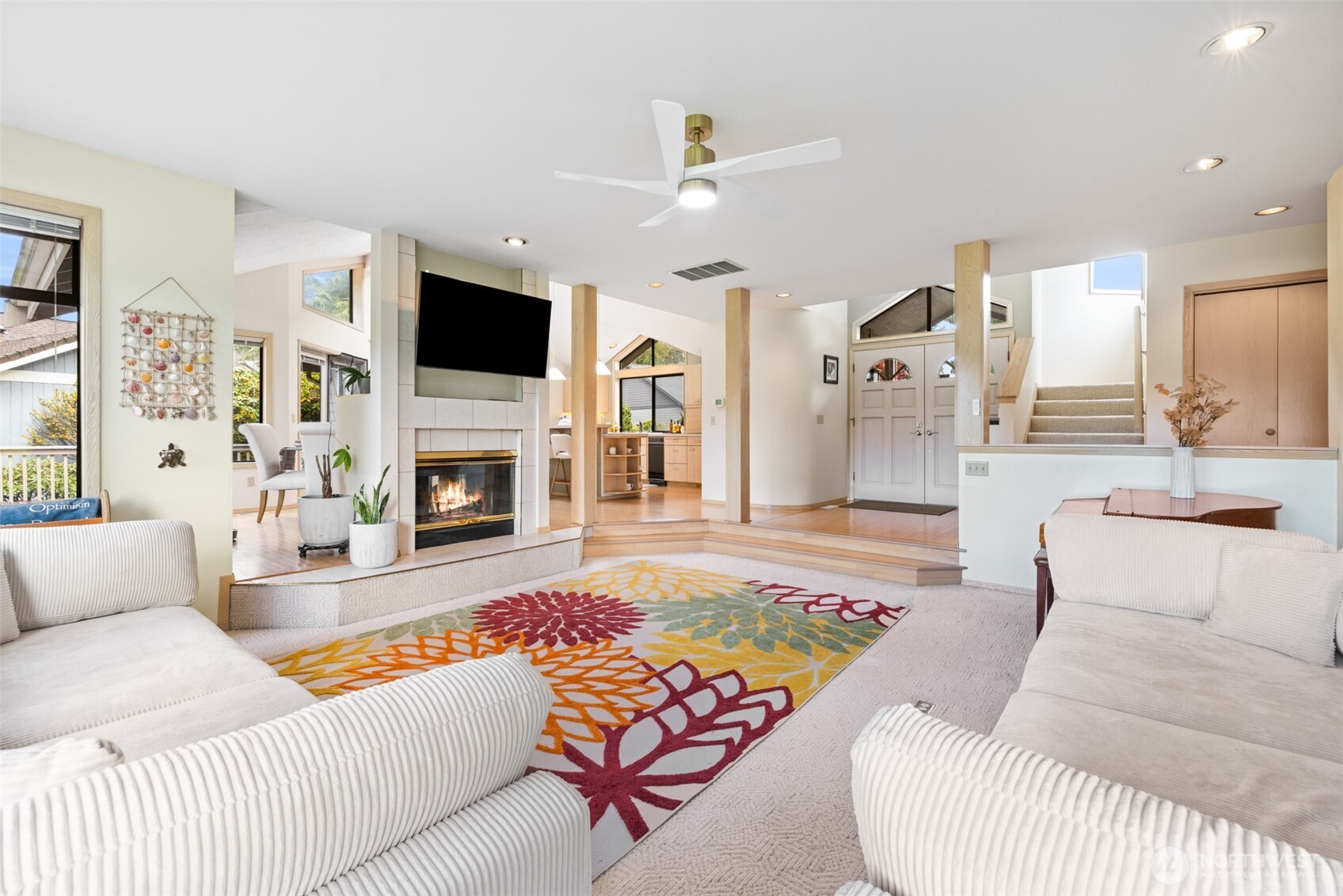 117 Williams Place Sequim, WA 98382 - Photo 15 of 40 a living room with fireplace furniture and a flat screen tv