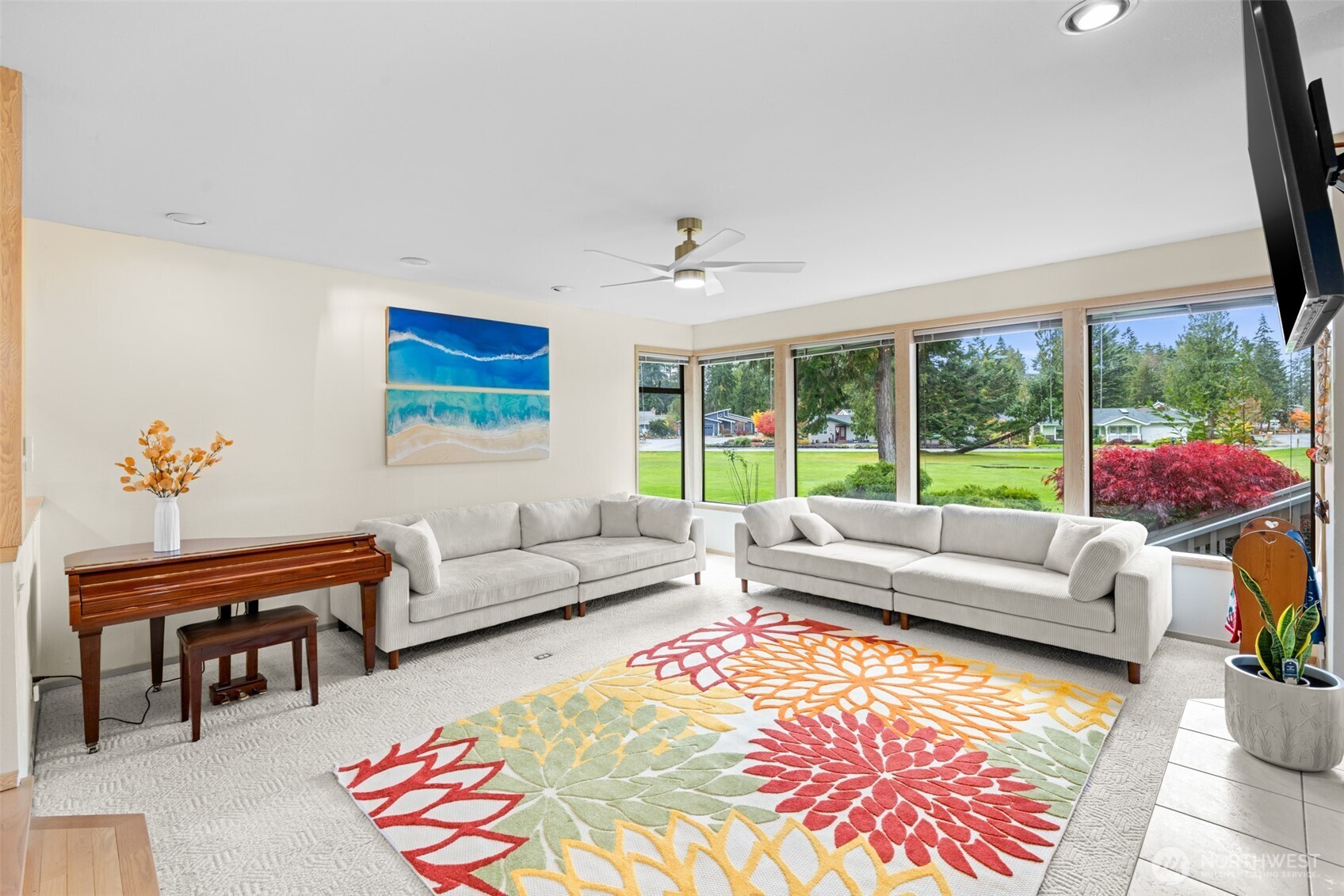 117 Williams Place Sequim, WA 98382 - Photo 16 of 40 a living room with furniture and a large window