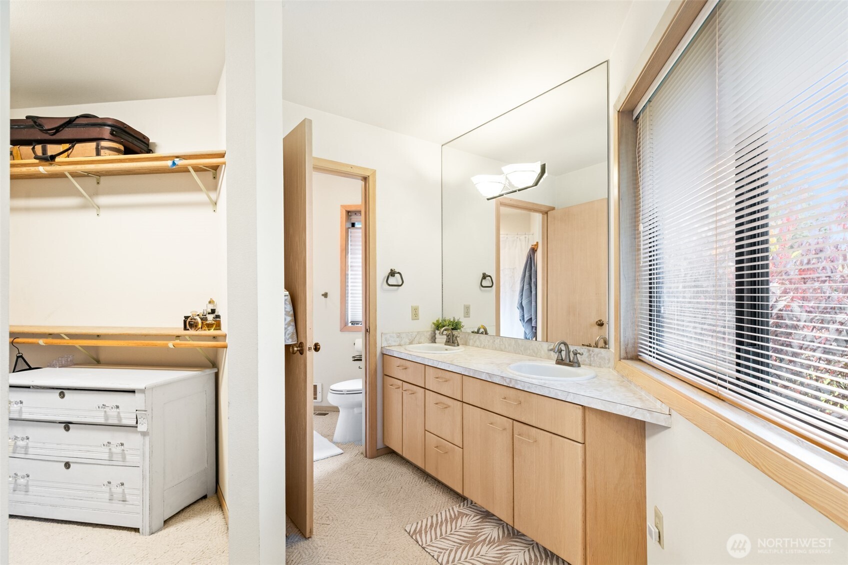 117 Williams Place Sequim, WA 98382 - Photo 18 of 40 a bathroom with a sink and a mirror