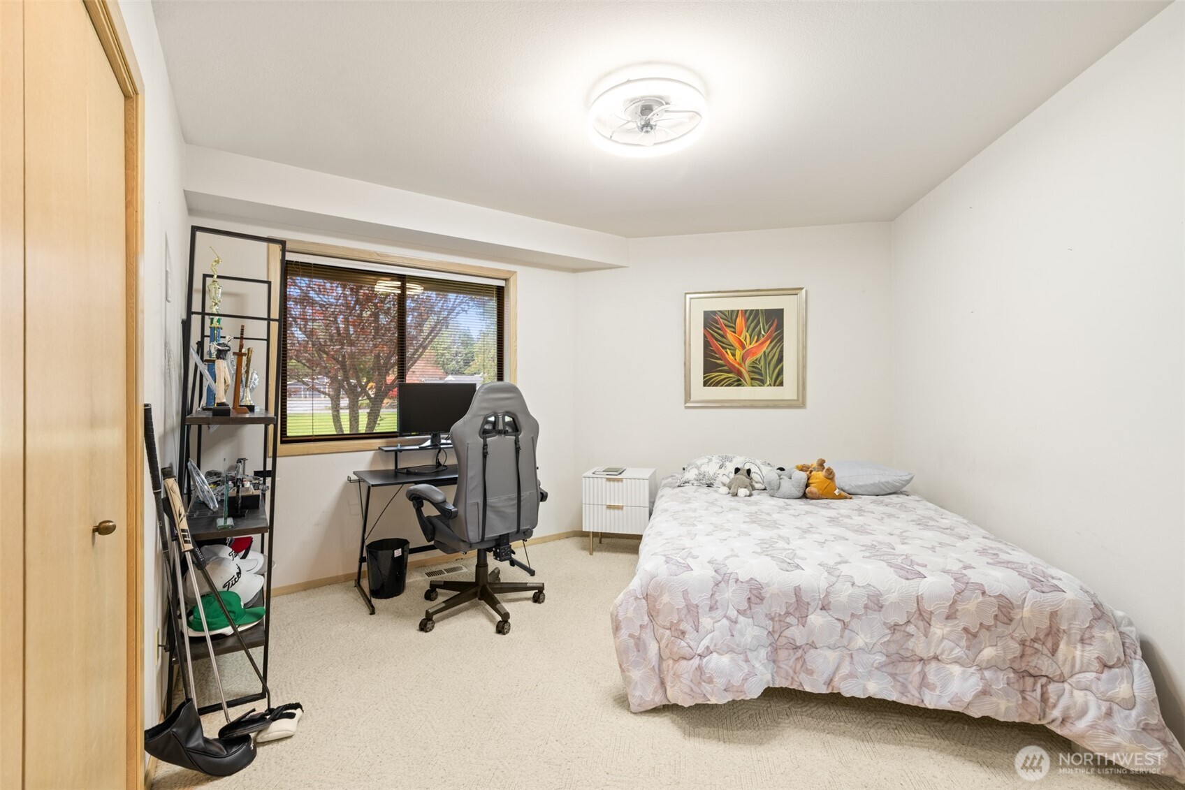 117 Williams Place Sequim, WA 98382 - Photo 24 of 40 a bed room with furniture and a flat screen tv