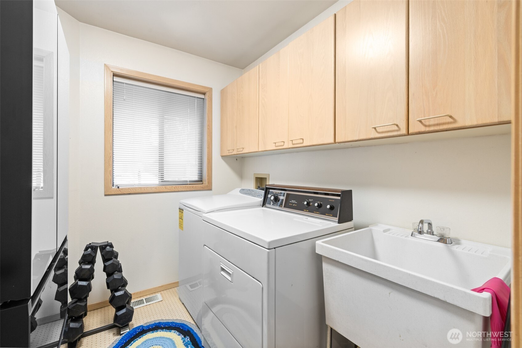 117 Williams Place Sequim, WA 98382 - Photo 26 of 40 a bathroom with a sink and a vanity