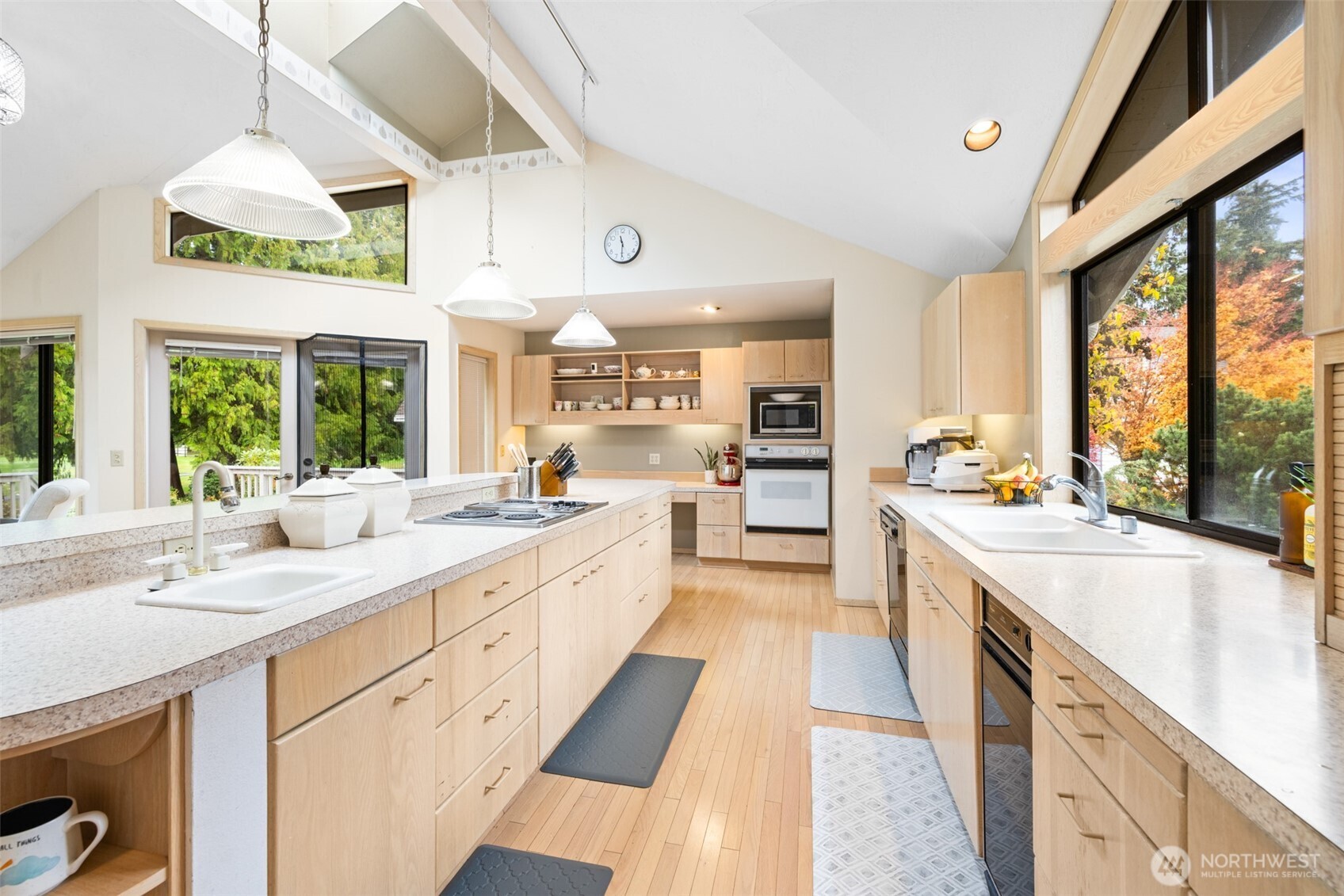117 Williams Place Sequim, WA 98382 - Photo 7 of 40 a large white kitchen with a large window