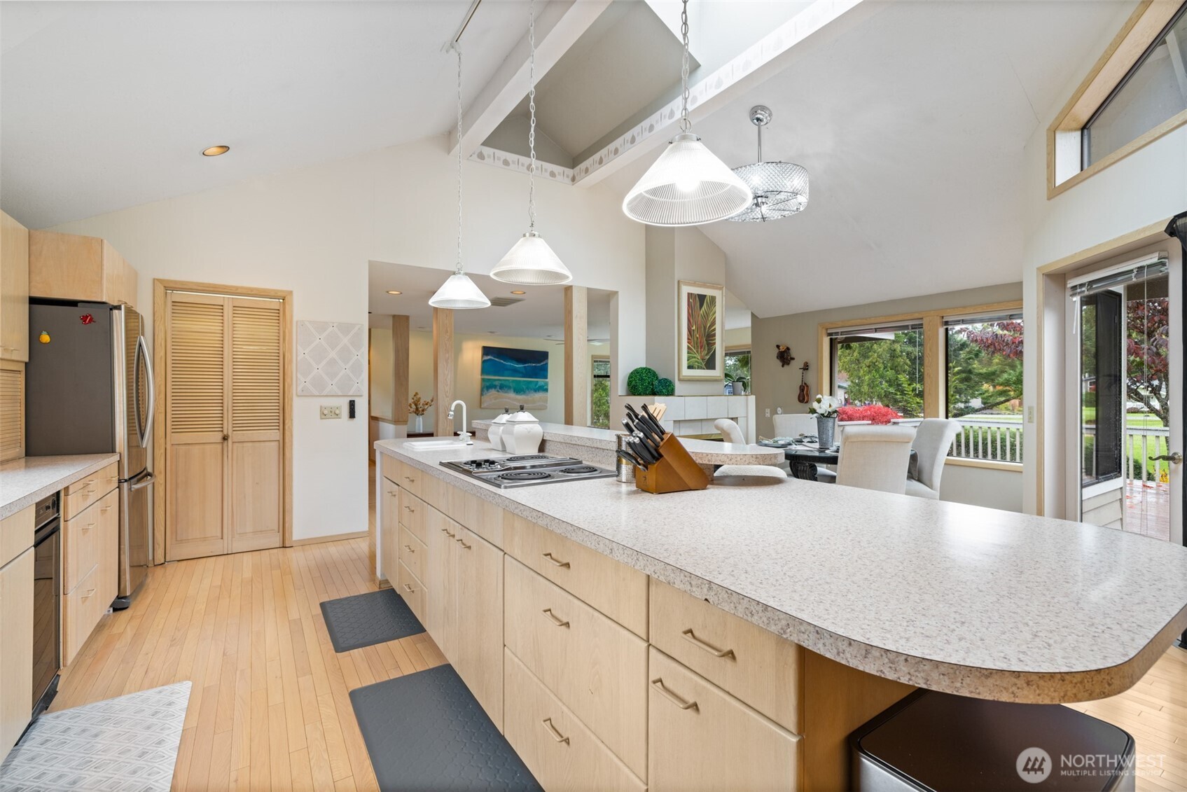 117 Williams Place Sequim, WA 98382 - Photo 10 of 40 a large kitchen with kitchen island a large counter space appliances and furniture
