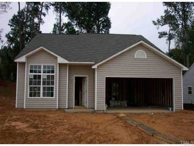 3637 Watkins Ridge Court Raleigh, NC 27616 - Photo 1 of 1 a front view of a house with a yard and garage