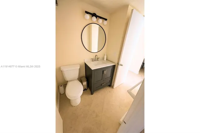 a view of a swimming pool with outdoor seating