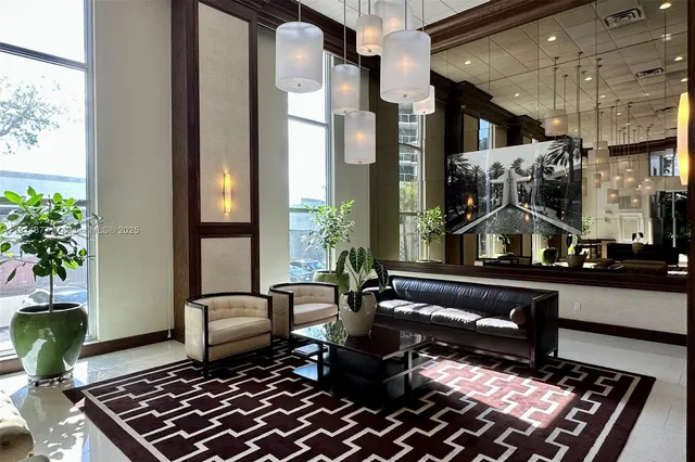 a kitchen with lots of counter top space and stainless steel appliances