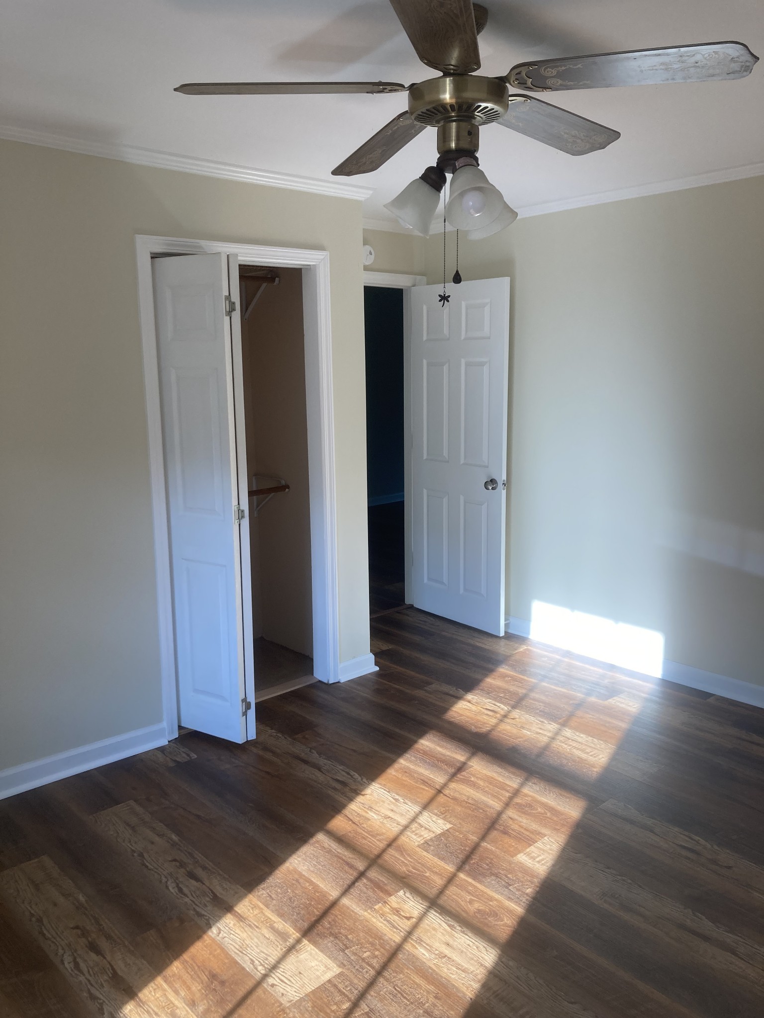 4516 Mansford Road Winchester, TN 37398 - Photo 14 of 53 a view of an empty room with window and wooden floor