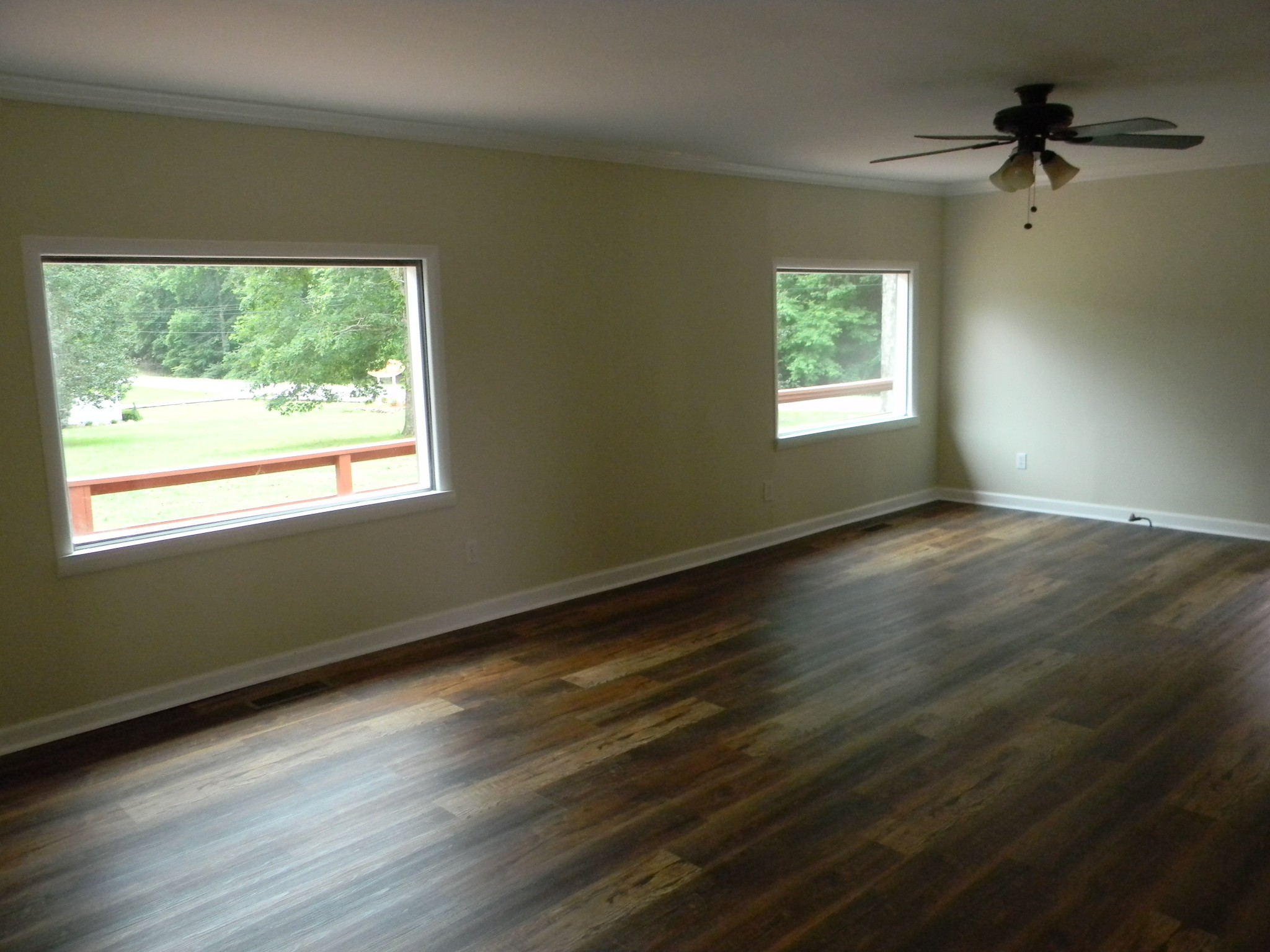 4516 Mansford Road Winchester, TN 37398 - Photo 50 of 53 a view of an empty room with wooden floor and a window