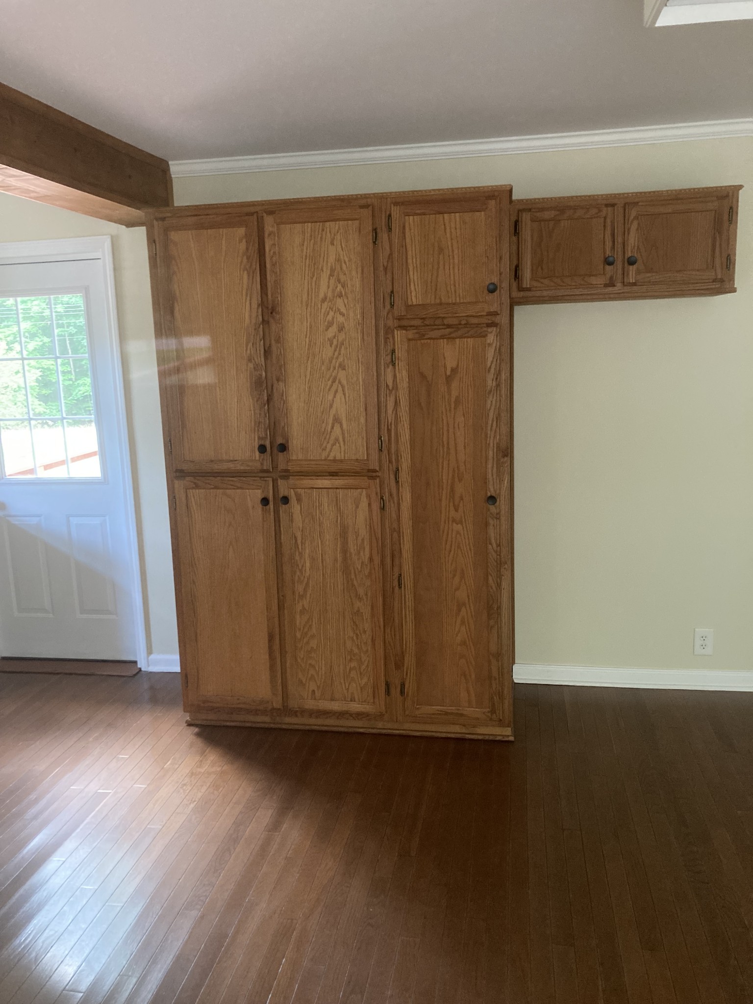4516 Mansford Road Winchester, TN 37398 - Photo 7 of 53 a view of an empty room with wooden floor and a window