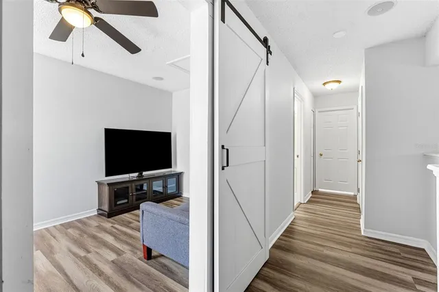 a bed room with a bed and a window