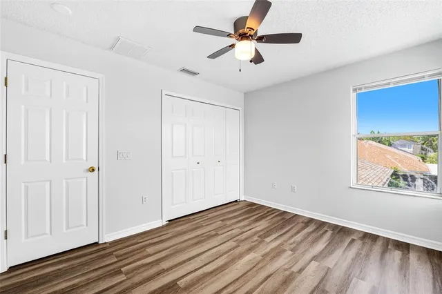 a bathroom with a sink a toilet and shower curtain
