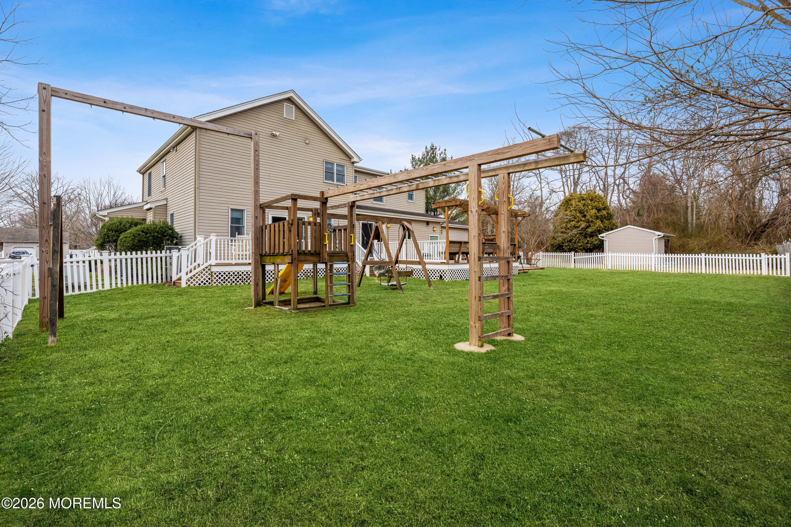 1 Kari Court Jackson, NJ 08527 - Photo 18 of 66 a view of a house with backyard and a tree
