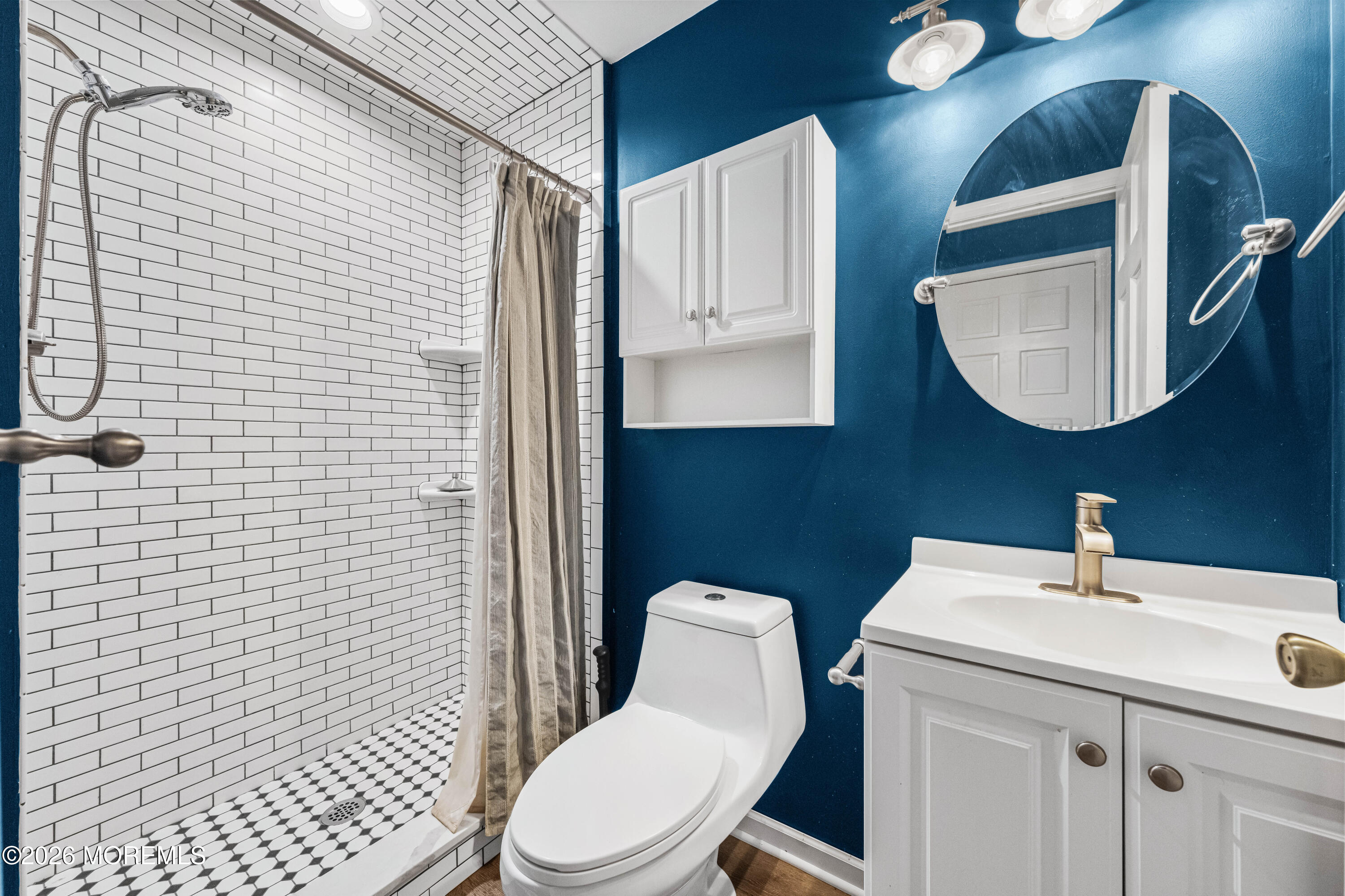 1 Kari Court Jackson, NJ 08527 - Photo 30 of 66 a bathroom with a toilet sink and mirror