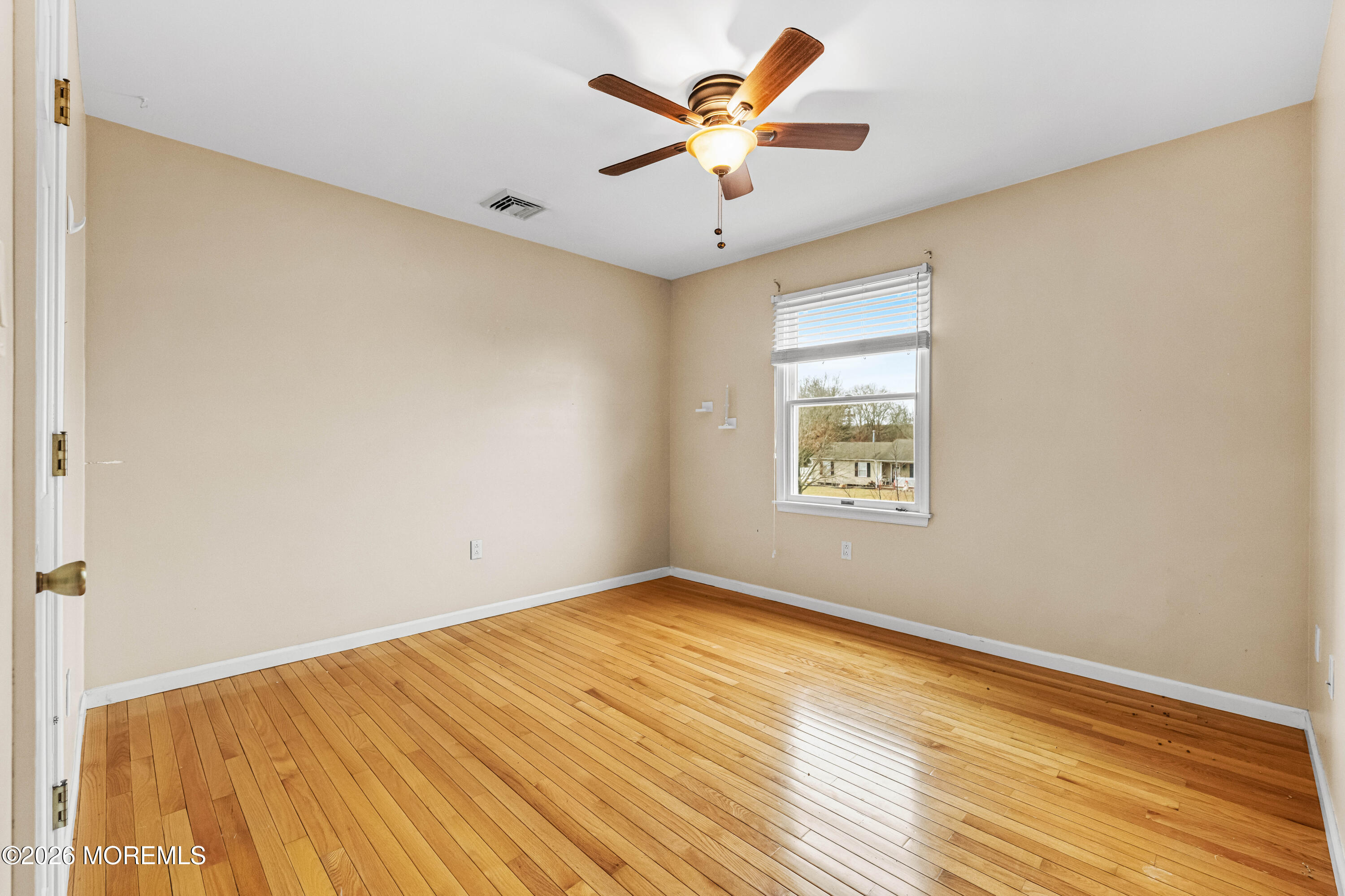 1 Kari Court Jackson, NJ 08527 - Photo 35 of 66 an empty room with a window and a ceiling fan